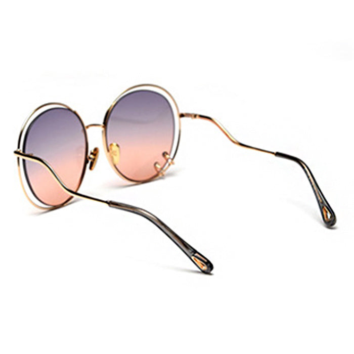 OVERSIZED PIERCED CIRCLE SUNGLASSES