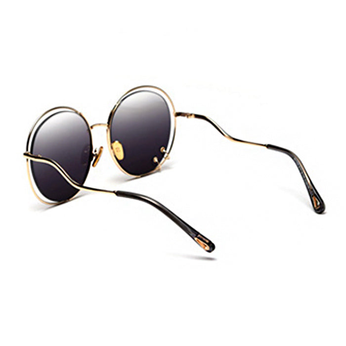 OVERSIZED PIERCED CIRCLE SUNGLASSES