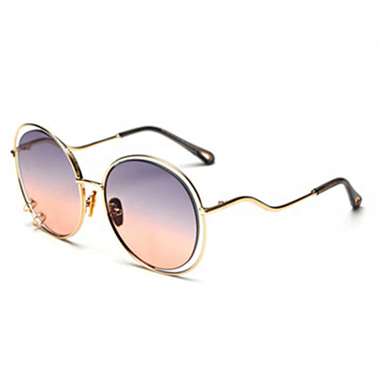 OVERSIZED PIERCED CIRCLE SUNGLASSES